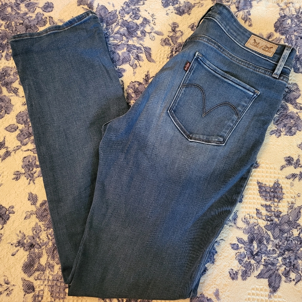 Levis Mid-Rise Straight Stretch in Med Wash sz 12